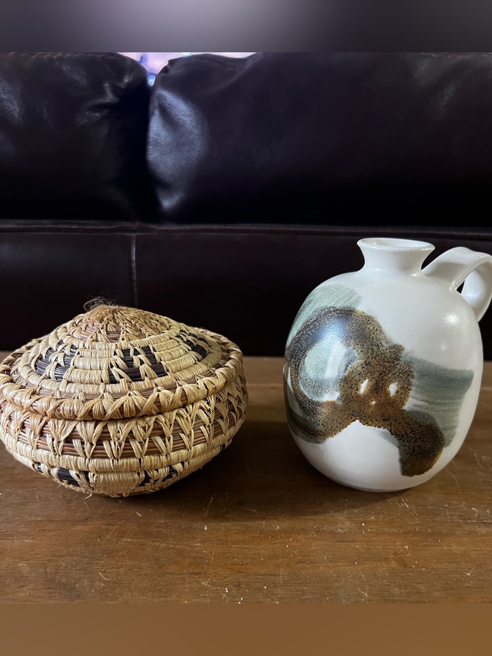 Two beautiful hand crafted items. Basket and small ceramic jug.